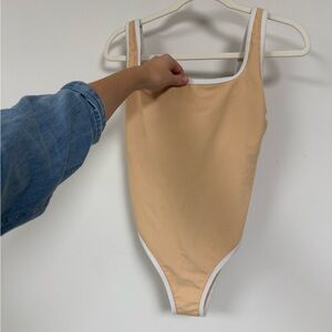 LainSnow neutral one piece, size L